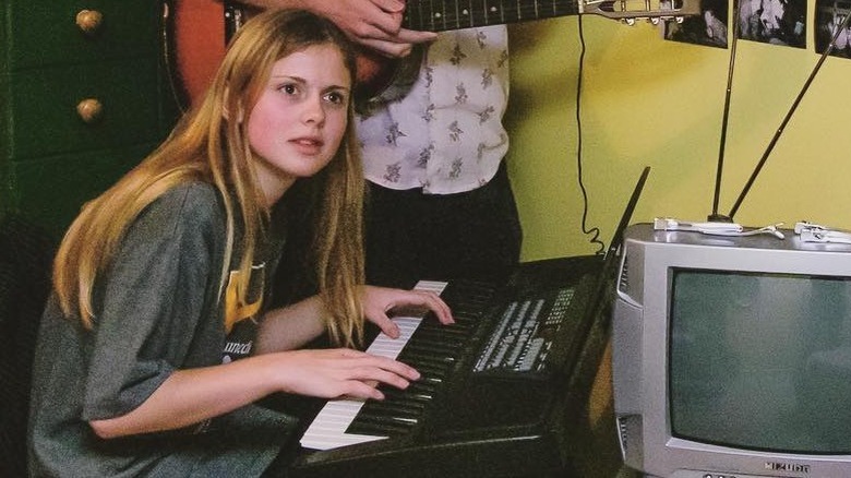 Young Rose McIver playing piano