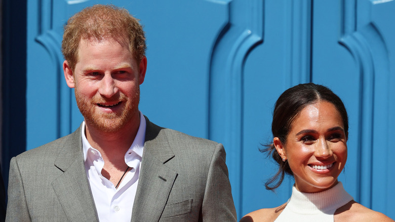 Prince Harry and Meghan Markle posing 