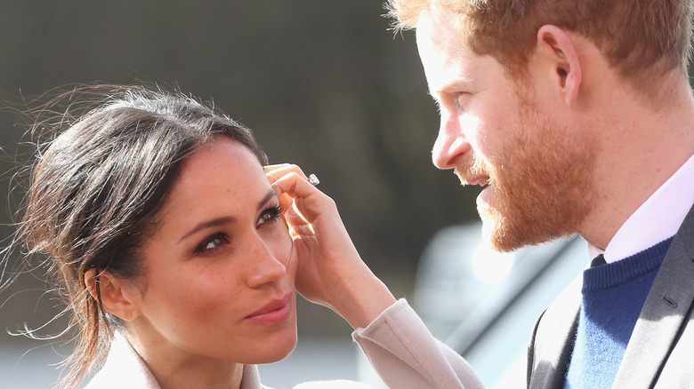 Prince Harry and Meghan Markle deep in discussion