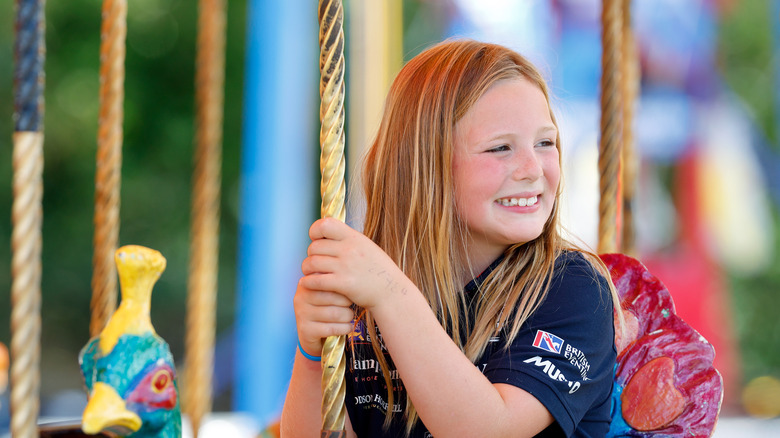 Mia Tindall on swings 