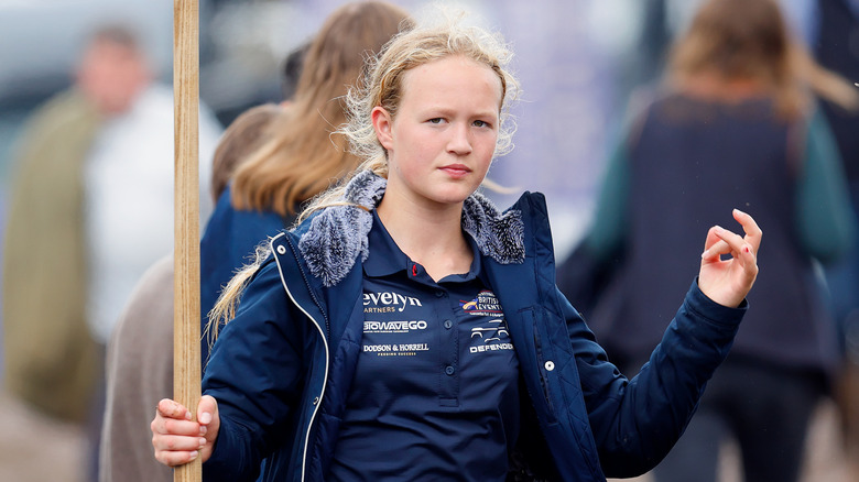 Savannah Phillips in blue windbreaker 