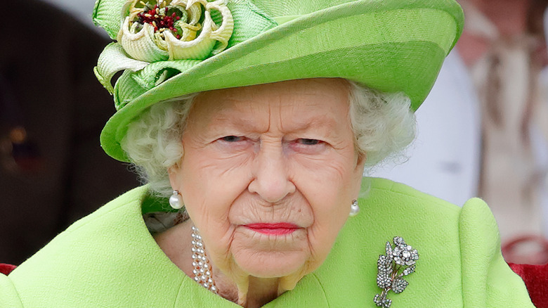 Queen Elizabeth looking serious and intimidating