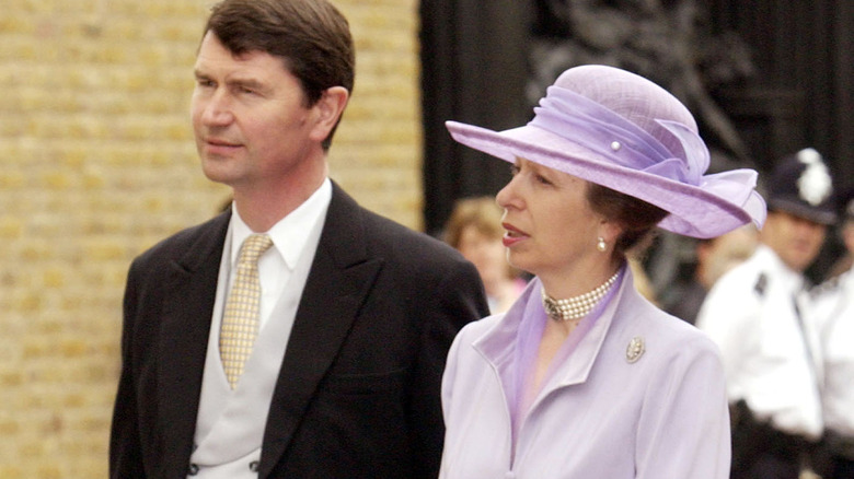 Princess Anne walking candidly with Sir Timothy Laurence 