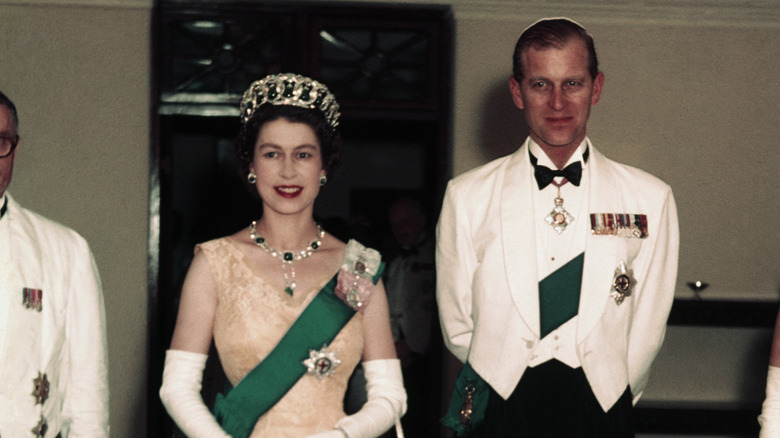 Young Queen Elizabeth II posing with Prince Philip