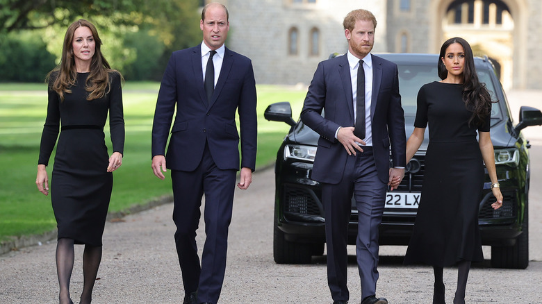 Kate Middleton, Prince William, Prince Harry, and Meghan Markle walking