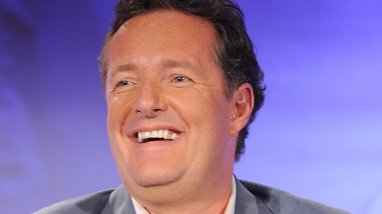 Piers Morgan laughing at his own joke