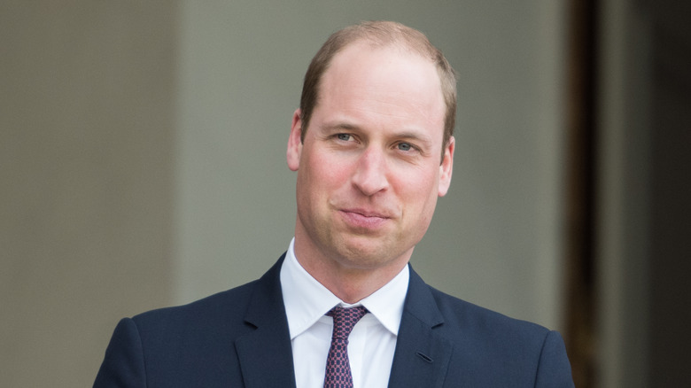 Prince William wears a suit at an event.