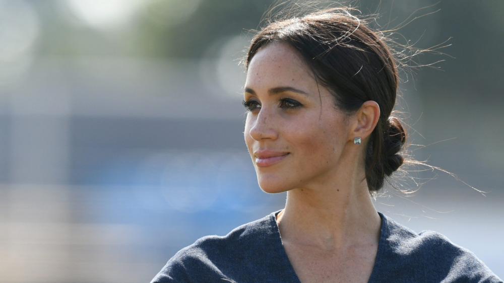 Meghan Markle looking to the side