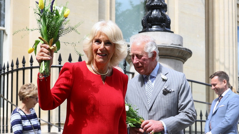 Prince Charles & Camilla Parker Bowles greeting a crowd