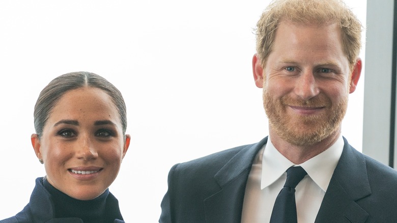 Meghan Markle and Prince Harry posing