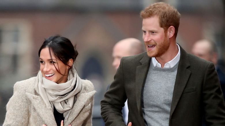 Prince Harry and Meghan Markle smiling