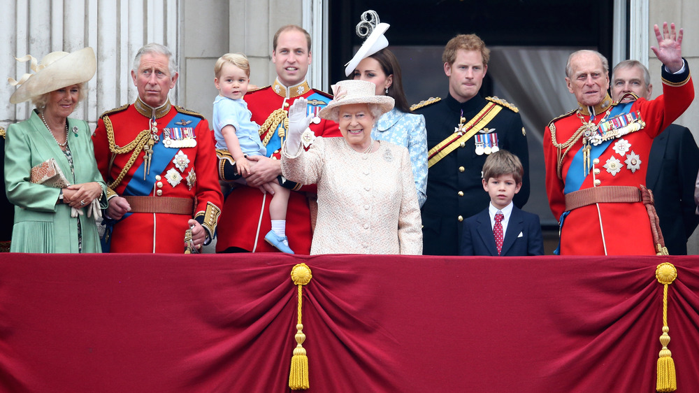 The British royal family poses for a photo oustide palace