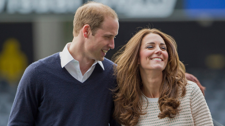 Prince William and Kate Middleton sharing a laugh while out and about