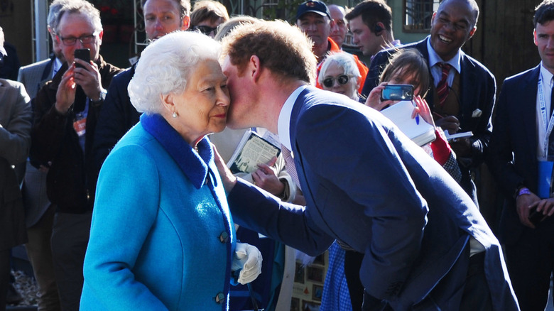 Prince Harry kissing Queen Elizabeth on the cheek