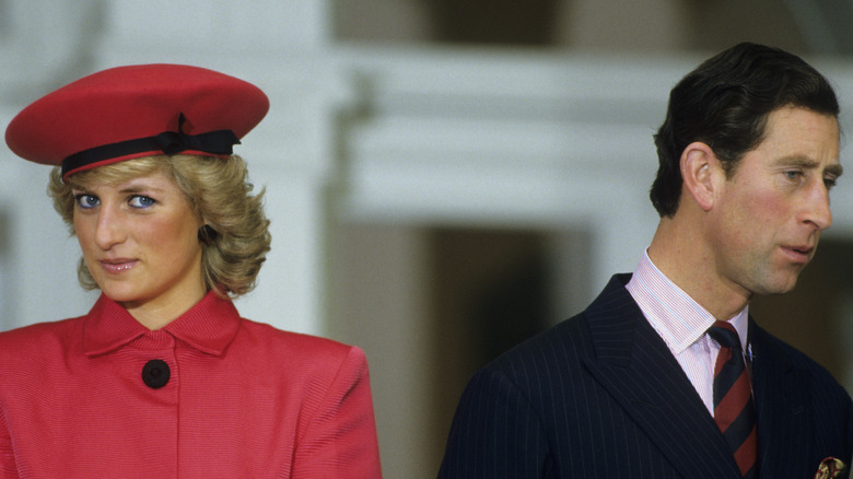 Princess Diana and Prince Charles looking away from one another 