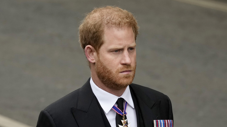 Prince Harry looks despondent while mourning the queen