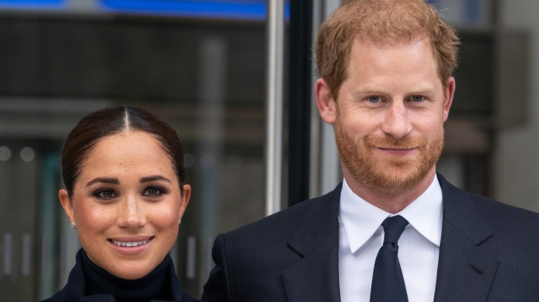 Meghan Markle and Prince Harry posing