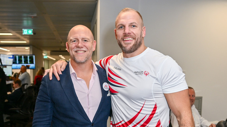 Friends Mike Tindall and James Haskell pose for a photo with arms around each other