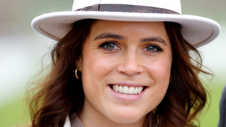 Princess Eugenie smiling at the camera