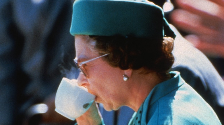 Queen Elizabeth II drinking tea 