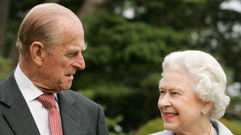 Prince Philip and Queen Elizabeth II in a garden 