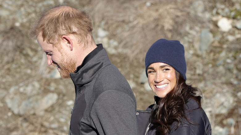 Meghan Markle smiling with Prince Harry