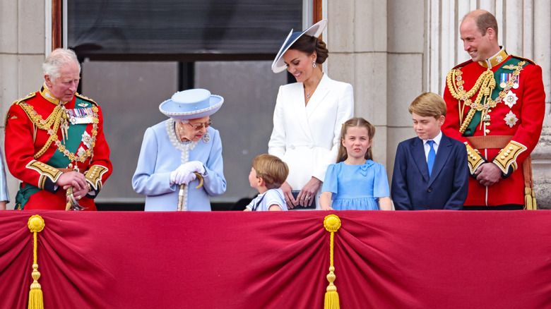 Prince Charles and Prince Louis on the balcony  