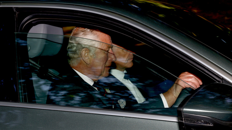 Prince Charles in a car