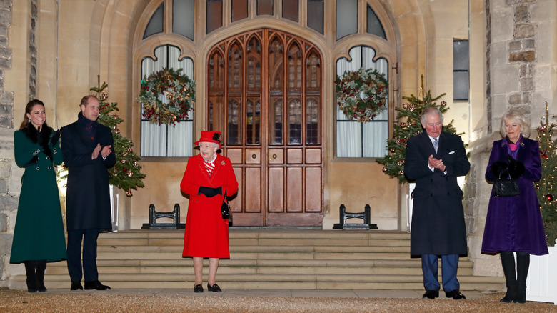 The royal family standing in front of St Mary Magdalene church