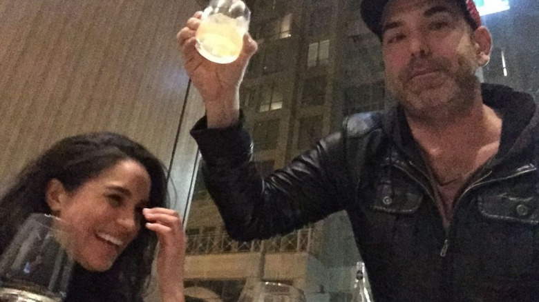 Rick Hoffman and Meghan Markle