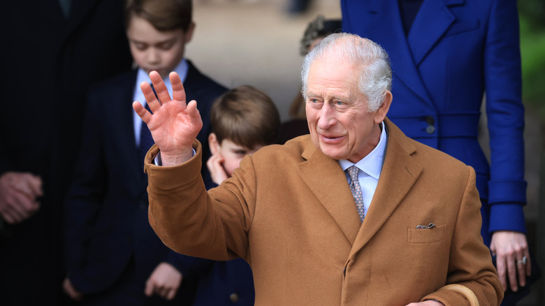 King Charles III waving 