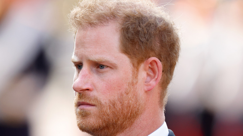 Prince Harry looks serious