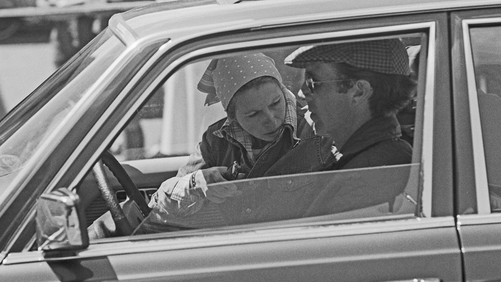 Princess Anne and Mark Phillips in a car