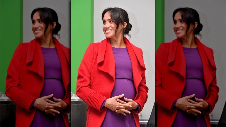 Meghan in purple and red