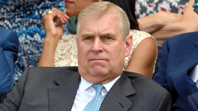 Prince Andrew frowning