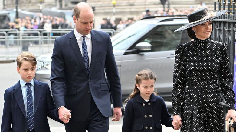 William, Kate, George, and Charlotte walking together