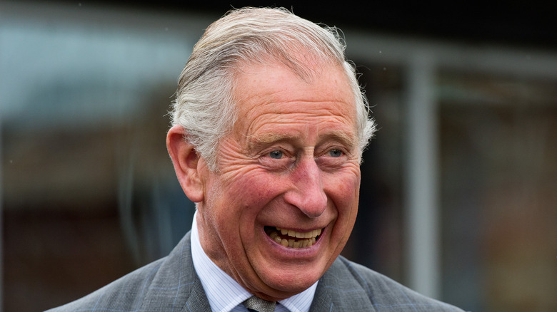 King Charles III smiling