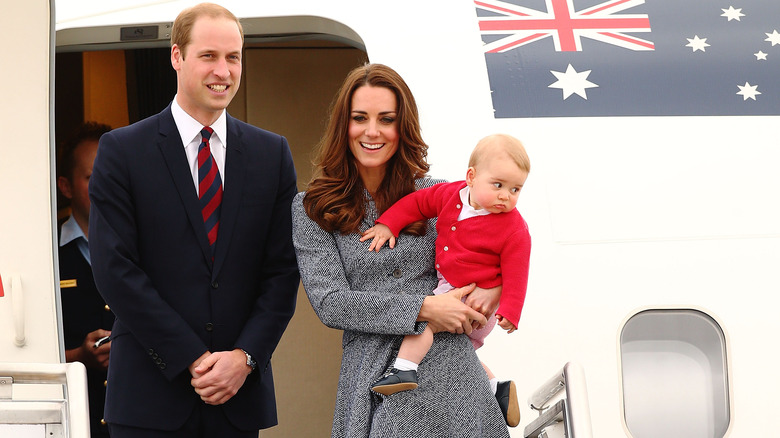 Prince William and family exiting plane