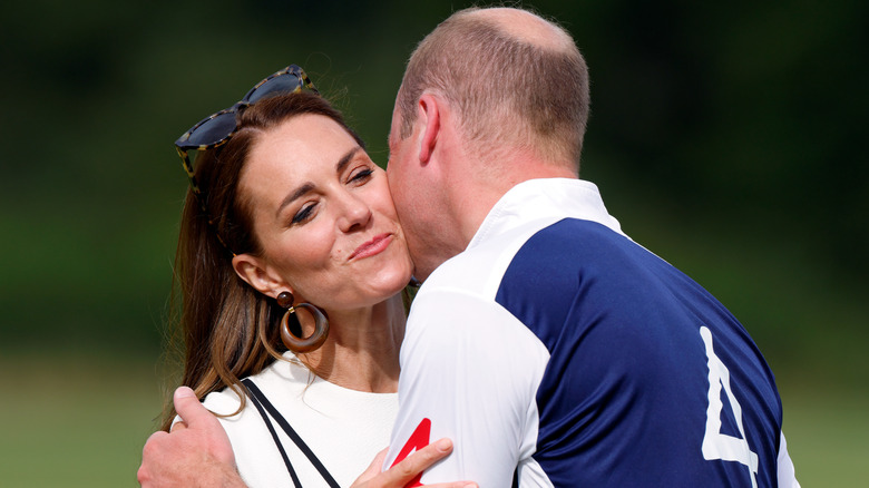 Prince William kissing Kate Middleton