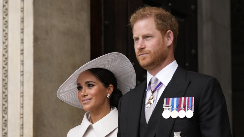 Harry and Meghan smiling 