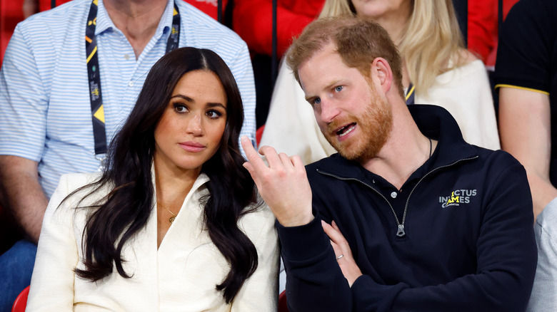 Harry and Meghan talking 