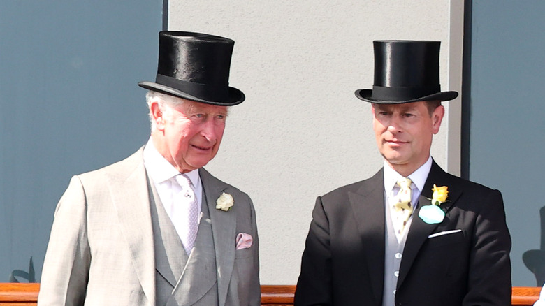 Prince Charles and Prince Edward wearing top hats