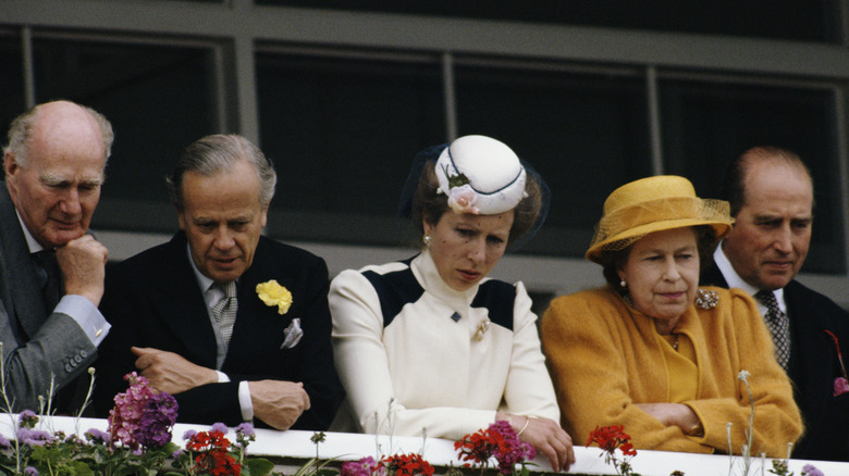 Princess Anne in black and white with royal family