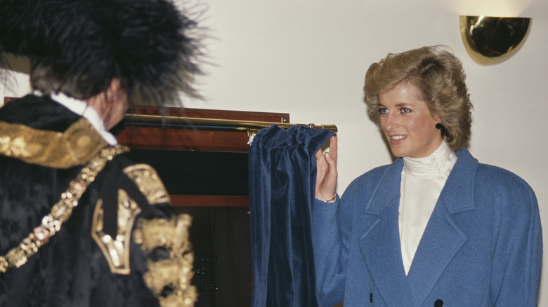 Princess Diana in oversized blue coat