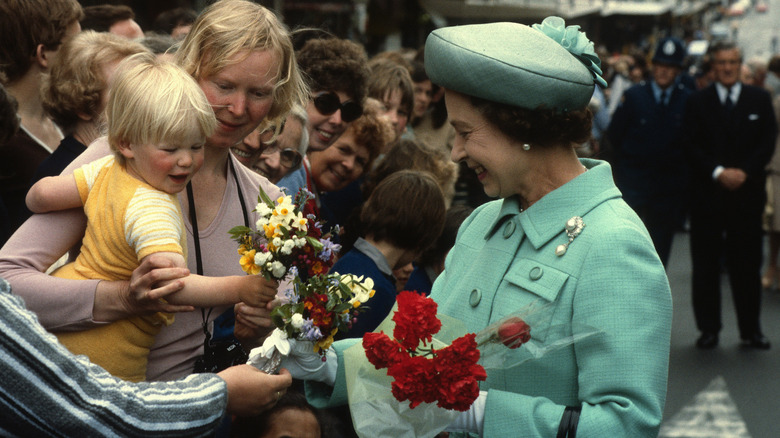 Queen Elizabeth II greeting members of the public