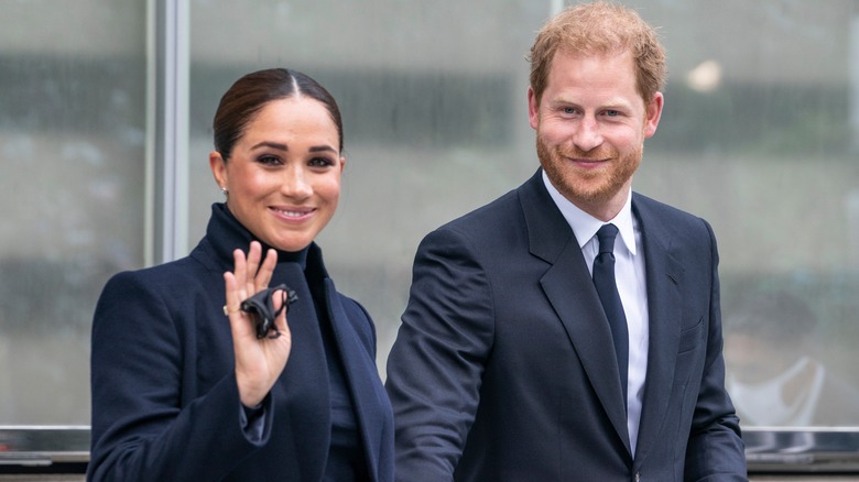 Prince Harry and Meghan Markle smiling