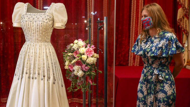 Princess Beatrice poses with vintage wedding dress