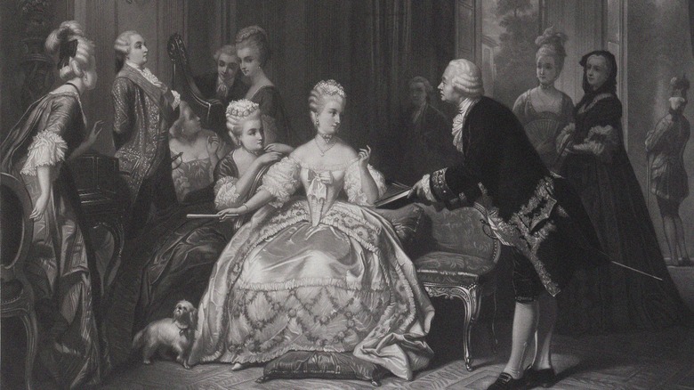 A depiction of Marie Antoinette all dressed up (middle)