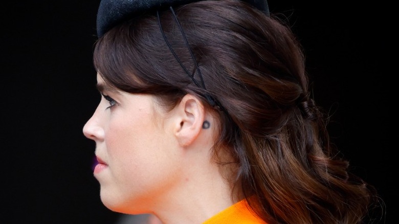 Princess Eugenie side profile showing tattoo