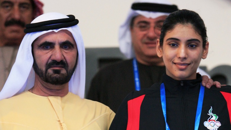 Sheikha Maitha bint Mohammed bin Rashid with her father